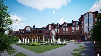 На фоні будівлі працюють фонтани