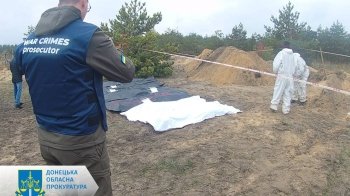У деокупованих Лимані та Святогірську виявили масові поховання людей
