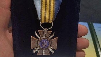 Нагрудний знак "За службу та звитягу"