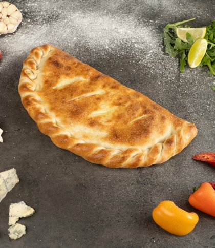 Ідеальне кальцоне вдома: простий рецепт італійської закритої піци