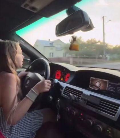 У Пустомитах батько посадив 8-річну доньку за кермо BMW для відео