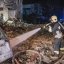 Рятувальники працюють на місці ракетного удару росіян по Київському району Харкова, 11 січня 2023