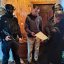 Фото з затримання одного з членів групи