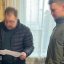 Затриманий підприємець читає повідомлення про підозру, фото СБУ