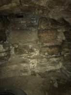 У підвалі аварійного будинку у Львові знайшли залишки стародавнього млина – 01